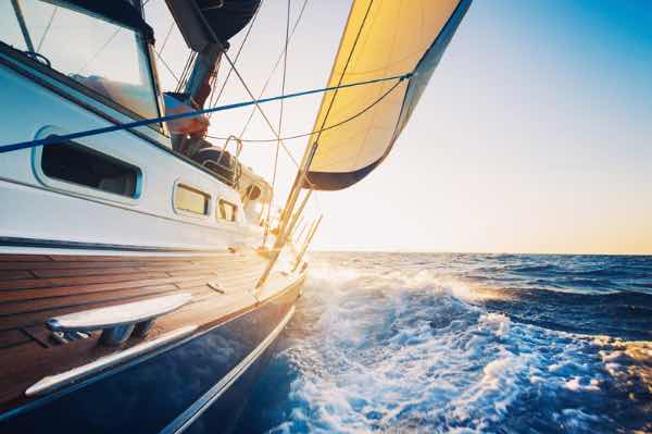 Sailboat Ocean Wallpaper : Sunlit Sailing Yacht Mural - flat design